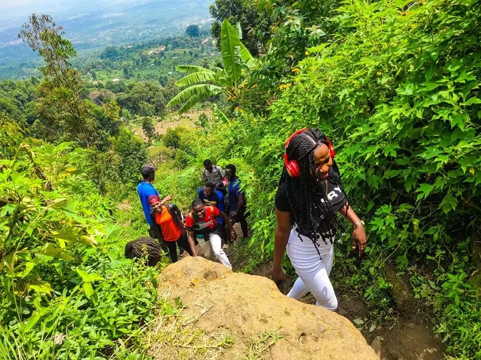 A group hiking through lush greenery